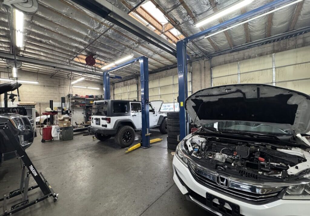Vehicles in the service bays at Reno Auto Works